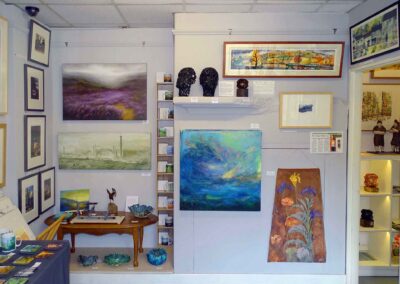 Jane's room Aug20 N Wall. Prints and watercolours by Jane Fielder Oils by Judith Levin David Starley and Clarke Avery