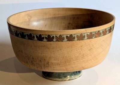 John Douglas and Nadine Blakemore JDNB01Turned Norwegian Maple (East Riddlesden Hall) bowl with Walnut and resin inlay on a ceramic base £185
