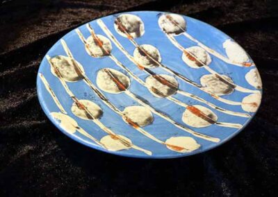 Nina Wright NW15 ceramic platter pale strings and blobs on blue £85